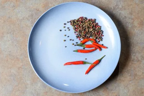 Plate with pepper Stock Photos