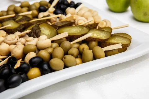 A plate of pickles on a buffet table. Selection of marinated mushrooms, salte Foto stock