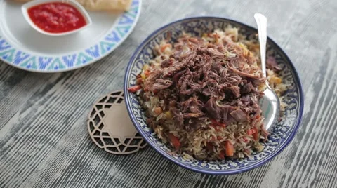 Plate of pilaf is on the table. Stock Footage 65814189