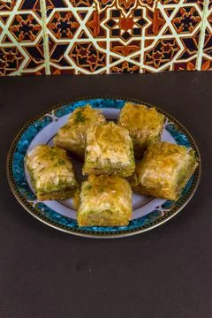 Plate piled with Baclava, elevated, portrait Stock Photos