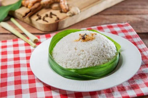 Plate of plain rice on the table in restaurant Stock Photos