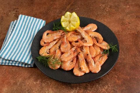 Plate of prawns close-up on a table Stock Photos