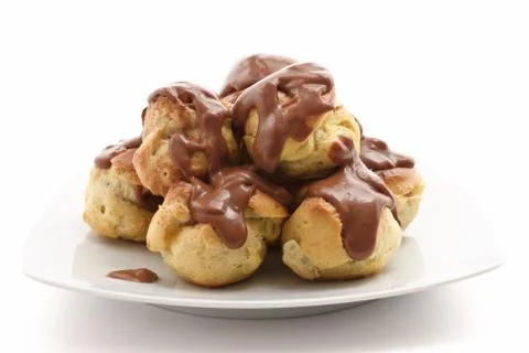 Plate with profiteroles Stock Photos
