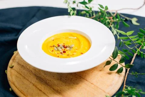 A plate of pumpkin soup Stock Photos