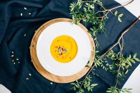 A plate of pumpkin soup Stock Photos