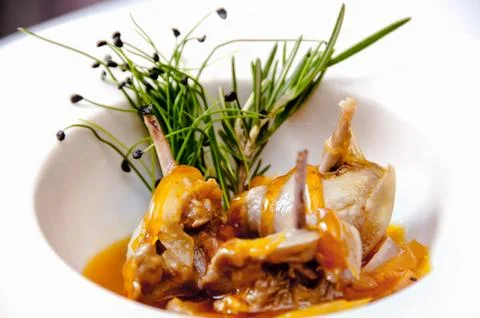 A plate of quail on a white background Stock Photos
