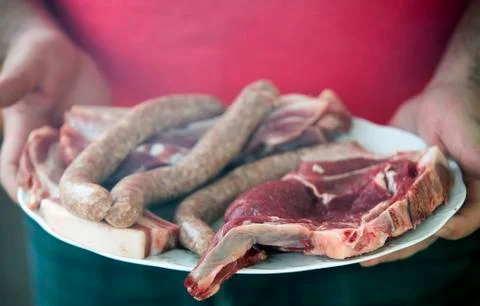 Plate of raw meat Stock Photos