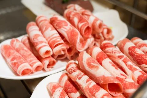 Plate of Raw Meat Stock Photos