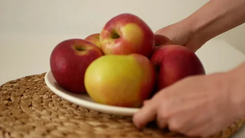 Plate with red apples Stock Footage 155739042