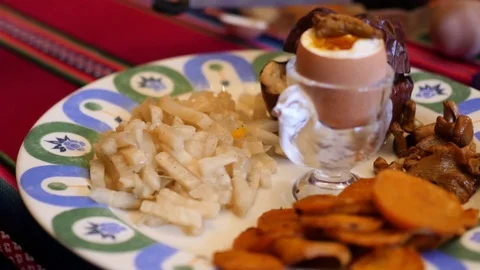 Plate in a restaurant on a colourful table. Stock Footage 99437783