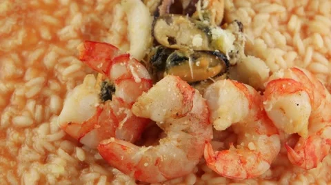 Plate of risotto with seafood (loop) Stock Footage 58517500