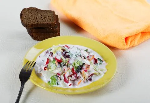 Plate of salad with black bread Stock Photos
