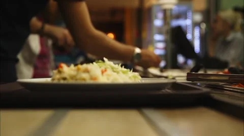 Plate with a Salad on a Tray Stock Footage 51963679