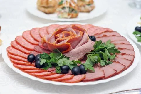 Plate with sausage Stock Photos