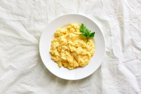 Plate with scrambled eggs Stock Photos