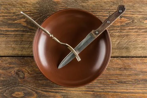 Plate setting on wooden table Stock Photos