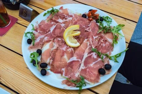 Plate of slice of Parma ham Stock Photos