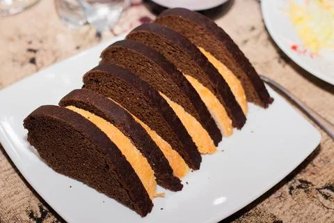 Plate with sliced bread on the table Stock Photos