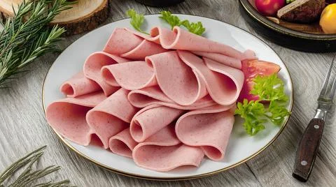 A plate of sliced meat Stock Photos