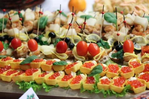 A plate with snacks at the party Stock Photos