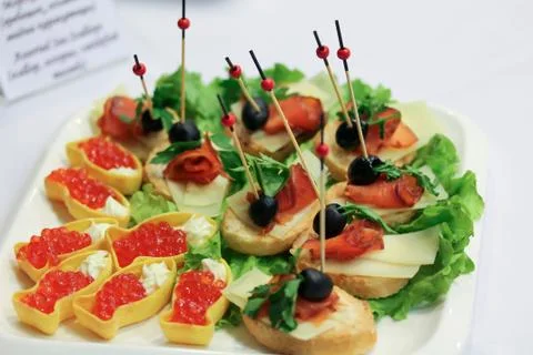 A plate with snacks at the party Stock Photos