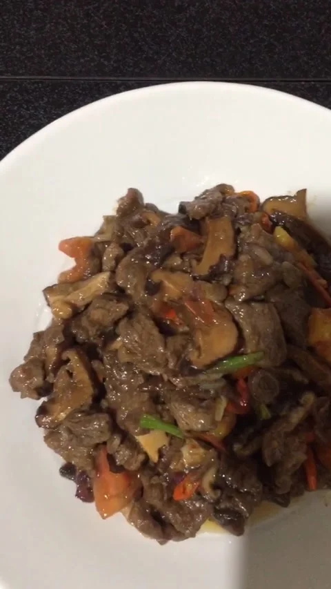 Plate of Stir-fried Beef and Mushrooms Stock Footage 331421413
