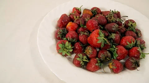 Plate of strawberries on white background.slide Stock Footage 61214660