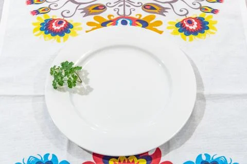 Plate on a table with lowicz pattern Stock Photos