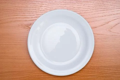 Plate on table Stock Photos