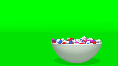 A plate of tablets cyclically revolves on a green screen Stock Footage 60705564