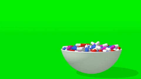 A plate of tablets on a green screen appears Vídeo Stock 60705810