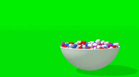 A plate of tablets on a green screen appears on top Stock Footage 60706116