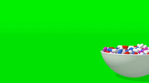 A plate of tablets on a green screen appears to the right Stock Footage 60706393
