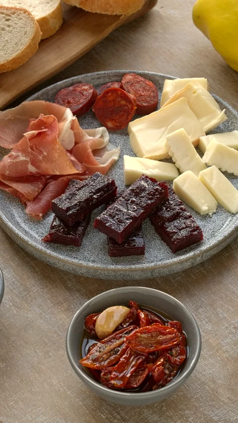 Plate with tapas and membrillo paste. Vertical video. Vertical video. Stock Footage 283449986