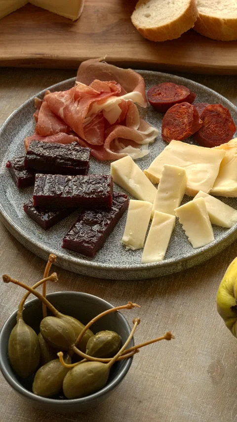 Plate with tapas and membrillo paste. Whole quinces. Vertical video. Stock Footage 284313528