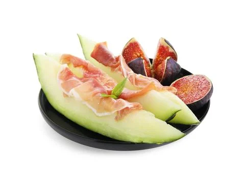Plate with tasty melon, jamon and figs isolated on white Stock Photos