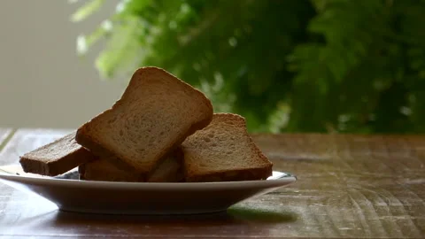 A plate of toast on the table, camera zooming in Stock Footage 230464558