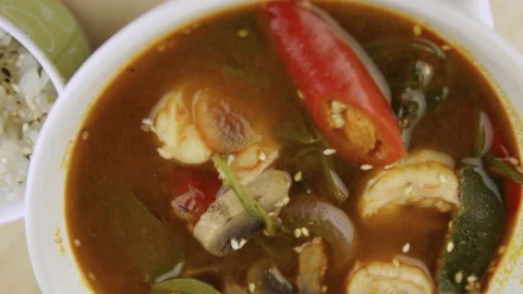 A plate of tom yam. Vertically. Stock Footage 155574268