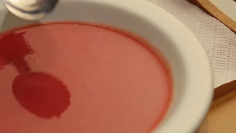 Plate of tomato soup Stock Footage 130451972