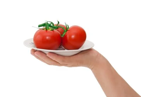 Plate with tomatoes Stock Photos