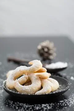 A plate of vanilla crescent biscuits Stock Photos