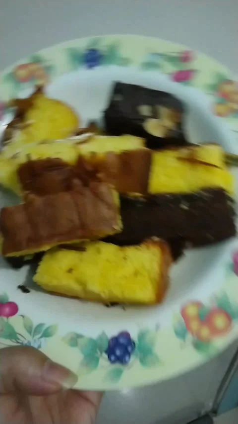 A plate of various sliced cake Stock Footage 275335609