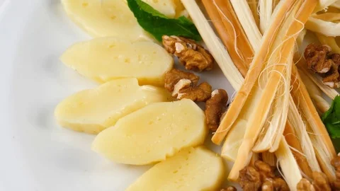 Plate with various types of cheese, close-up Stock Footage 84261185