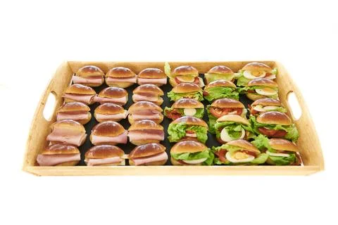 Plate of vegetable bread roll with tomato, lettuce and egg and bread roll ham Stock-Fotos