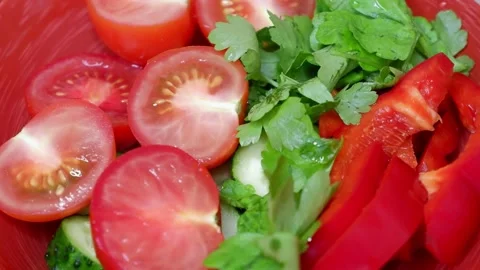 The plate of vegetable salad is spinning. Stock Footage 154458749