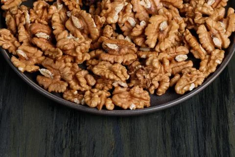 Plate of walnuts Stock Photos