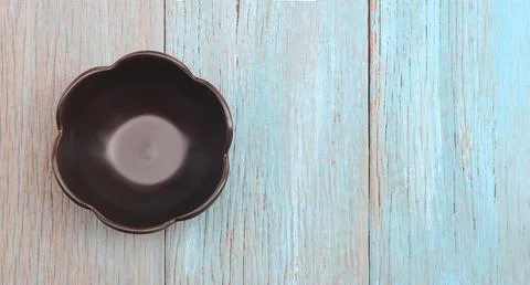 Plate on wood table background Stock Photos