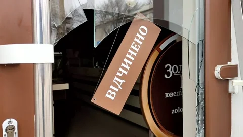 Plate with word Open hangs on broken door of jewelry store Video stock 189747163