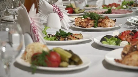 Plates with different food on the table Stock Footage 73515550