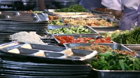 Plates with food in a school canteen in China Stock Footage